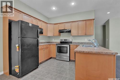 3876 Robinson Street, Regina, SK - Indoor Photo Showing Kitchen With Double Sink