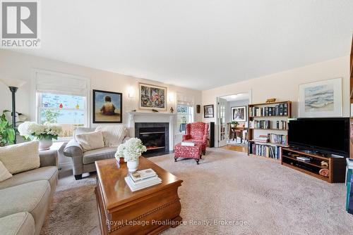 10 Skiff Cove Road, Prince Edward County (Wellington Ward), ON - Indoor Photo Showing Living Room With Fireplace