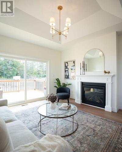 159 Pomeroy Avenue, Tweed (Tweed (Village)), ON - Indoor Photo Showing Living Room With Fireplace