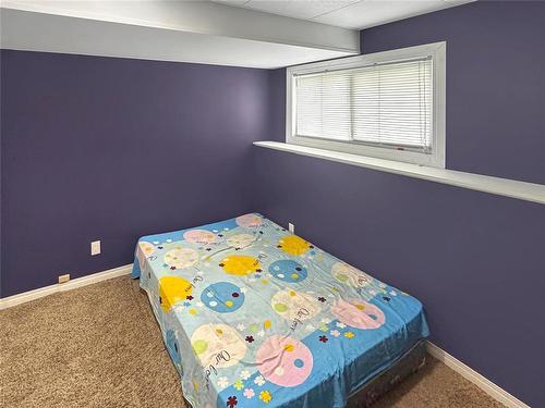 64 Coulter Way, Brandon, MB - Indoor Photo Showing Bedroom