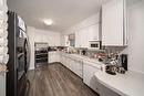 411 Ash Avenue, Steinbach, MB  - Indoor Photo Showing Kitchen With Double Sink 