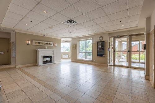 Autre - 716-7680 Boul. Marie-Victorin, Brossard, QC - Indoor With Fireplace