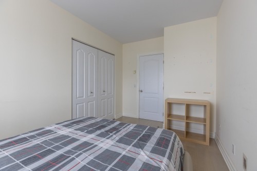 Chambre à coucher - 716-7680 Boul. Marie-Victorin, Brossard, QC - Indoor Photo Showing Bedroom