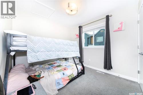 303 Delainey Manor, Saskatoon, SK - Indoor Photo Showing Bedroom