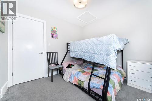 303 Delainey Manor, Saskatoon, SK - Indoor Photo Showing Bedroom