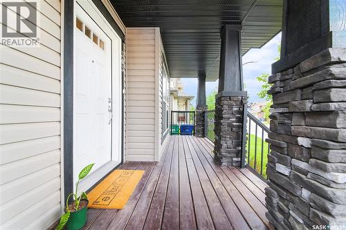 303 Delainey Manor, Saskatoon, SK - Outdoor With Deck Patio Veranda With Exterior