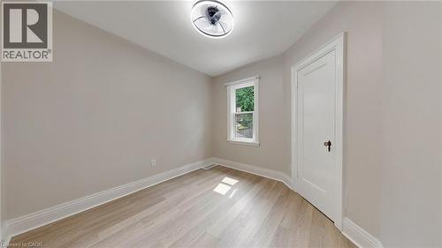Room featuring light wood-finish flooring and neutral wall tones - 59 Longwood Road N, Hamilton, ON - Indoor Photo Showing Other Room