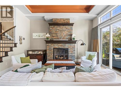 8049 Okanagan Landing Road, Vernon, BC - Indoor Photo Showing Living Room With Fireplace