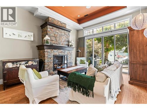 8049 Okanagan Landing Road, Vernon, BC - Indoor Photo Showing Living Room With Fireplace