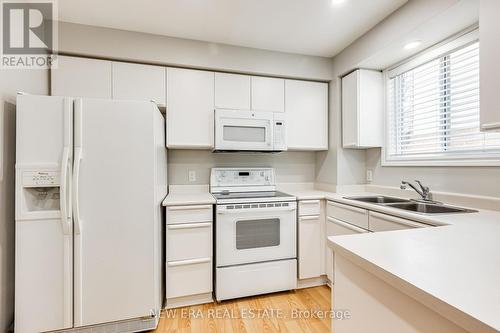 4059 Teakwood Drive, Mississauga, ON - Indoor Photo Showing Kitchen With Double Sink