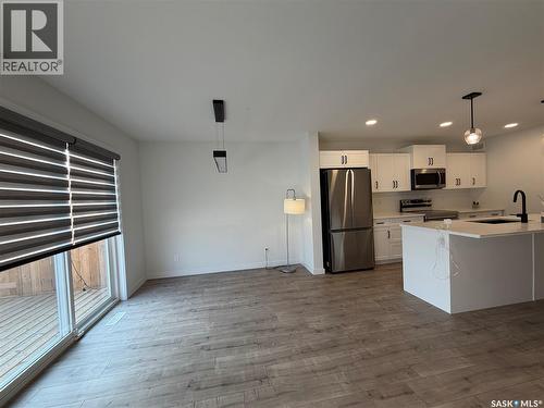 114 Cowessess Road, Saskatoon, SK - Indoor Photo Showing Kitchen With Stainless Steel Kitchen