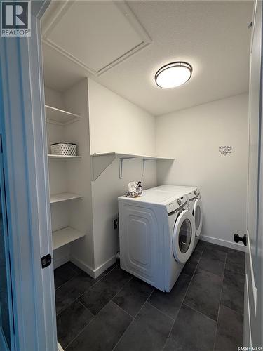 114 Cowessess Road, Saskatoon, SK - Indoor Photo Showing Laundry Room