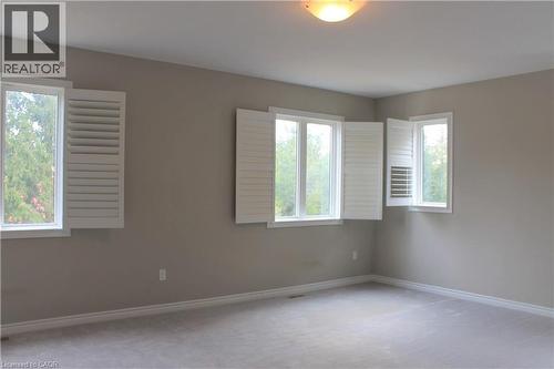 Neutral wall tones with white trim throughout - 31 Pointer Street Unit# Main Floor, Cambridge, ON - Indoor Photo Showing Other Room