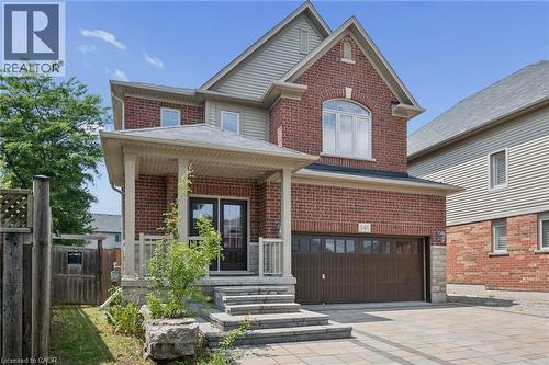 Brick and siding facade with a covered porch entry - 145 Redtail Street, Kitchener, ON - Outdoor