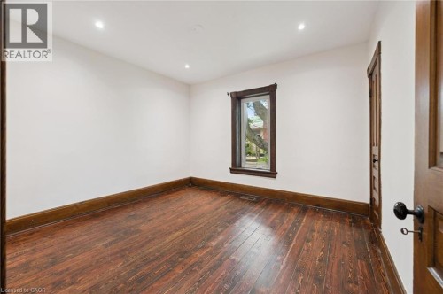 Room featuring wood-finish flooring, white walls, and recessed lighting - 245 Lowther Street S, Cambridge, ON - Indoor Photo Showing Other Room