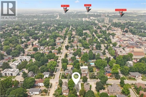 Aerial view of a residential neighborhood with verdant tree cover - 245 Lowther Street S, Cambridge, ON - Outdoor With View