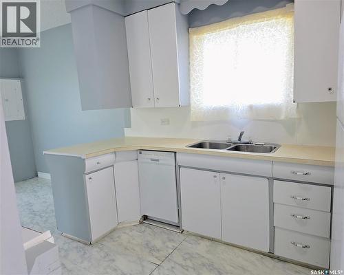 116 2Nd Avenue, Meacham, SK - Indoor Photo Showing Kitchen With Double Sink