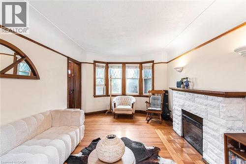 52 Cameron Avenue S, Hamilton, ON - Indoor Photo Showing Living Room With Fireplace