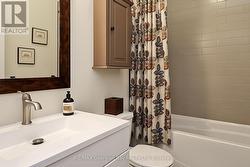 FULL BATH BETWEEN BEDROOMS 2 & 3 - 