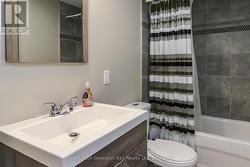 FULL BATH IN GAMES AREA - 