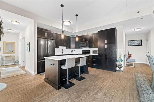 112-300 Centre St, Winnipeg, MB - Indoor Photo Showing Kitchen With Stainless Steel Kitchen With Upgraded Kitchen