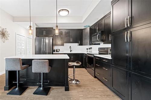 112-300 Centre St, Winnipeg, MB - Indoor Photo Showing Kitchen With Stainless Steel Kitchen With Upgraded Kitchen
