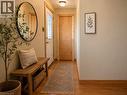 Entryway featuring a decorative transom door, wood-finish flooring, and natural wood trim - 274 East 38Th Street, Hamilton, ON  - Indoor Photo Showing Other Room 