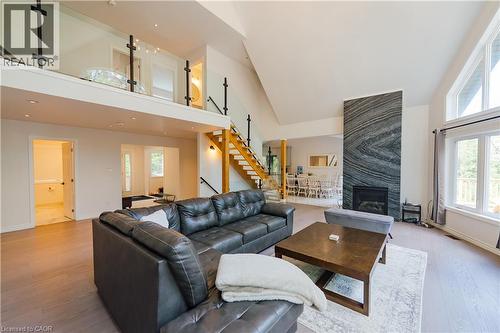 95 Chipmunk Lane, Magnetawan, ON - Indoor Photo Showing Living Room With Fireplace
