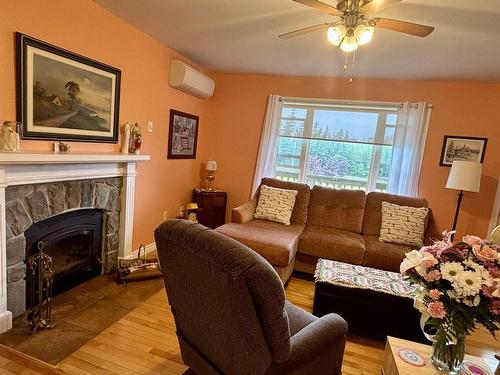1619 Gabarus Highway, Prime Brook, NS - Indoor Photo Showing Living Room With Fireplace