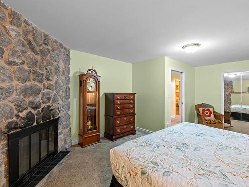 58 Skyview Drive, Charlottetown, PE - Indoor Photo Showing Bedroom With Fireplace