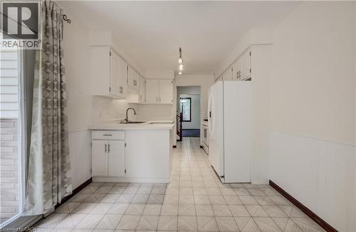 Easy care tile floor. - 197 Southwood Drive, Kitchener, ON - Indoor Photo Showing Kitchen