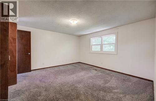 Primary bedroom facing rear with twin closets. Ensuite privilege. - 197 Southwood Drive, Kitchener, ON - Indoor Photo Showing Other Room