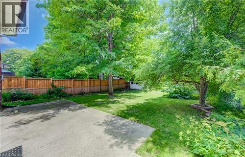 Large concrete patio out back. - 197 Southwood Drive, Kitchener, ON - Outdoor