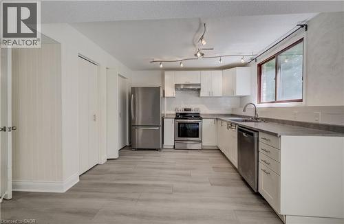 Modern cabinetry and appliances. - 197 Southwood Drive, Kitchener, ON - Indoor Photo Showing Kitchen
