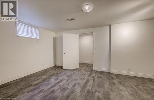 Primary bedroom with walk-in closet. - 197 Southwood Drive, Kitchener, ON - Indoor Photo Showing Other Room