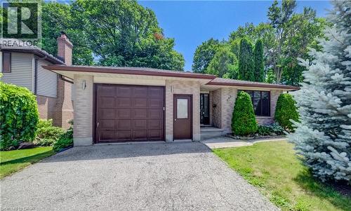 Single garage plus side by side parking. - 197 Southwood Drive, Kitchener, ON - Outdoor