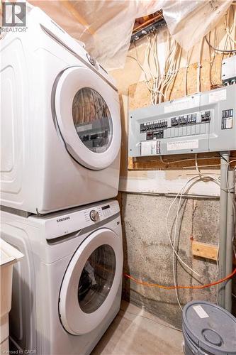 Stackable front-load washer and dryer set - 185 Highland Crescent Unit# 2, Kitchener, ON - Indoor Photo Showing Laundry Room