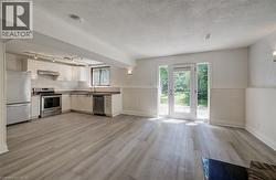 Garden door with sidelites really brings in natural light to lower unit. - 