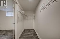 Walk-in closet, primary bedroom, lower unit. - 