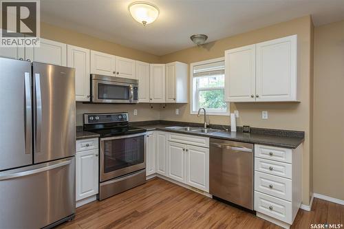 156 203 Herold Terrace, Saskatoon, SK - Indoor Photo Showing Kitchen With Double Sink