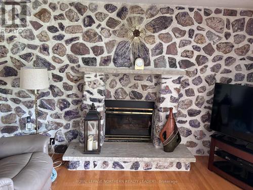 324 Third Avenue, Cochrane, ON - Indoor With Fireplace