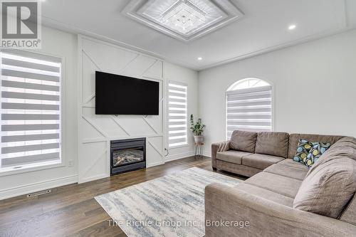 Family room - 59 Tarquini Crescent, Caledon, ON - Indoor Photo Showing Living Room With Fireplace