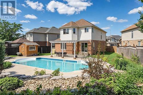 63 Dubrick Crescent, Kitchener, ON - Outdoor With In Ground Pool With Deck Patio Veranda