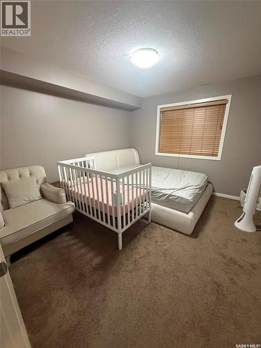 26 5742 Gordon Road, Regina, SK - Indoor Photo Showing Bedroom