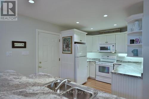 1327 River Road E, Wasaga Beach, ON - Indoor Photo Showing Kitchen With Double Sink