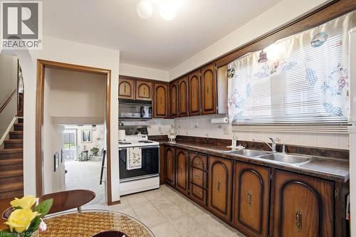 229 East 8Th Street, Hamilton, ON - Indoor Photo Showing Kitchen With Double Sink