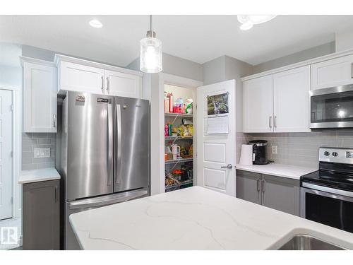 1416 169 St Sw, Edmonton, AB - Indoor Photo Showing Kitchen With Stainless Steel Kitchen