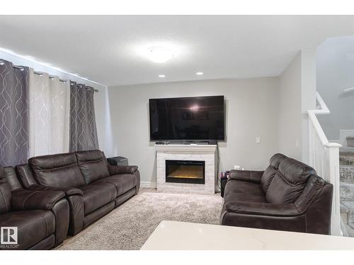 1416 169 St Sw, Edmonton, AB - Indoor Photo Showing Living Room With Fireplace