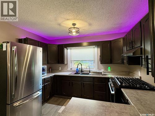 105 5Th Avenue, Hodgeville, SK - Indoor Photo Showing Kitchen With Double Sink