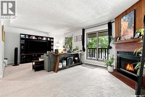 219 122 Edinburgh Place, Saskatoon, SK - Indoor With Fireplace